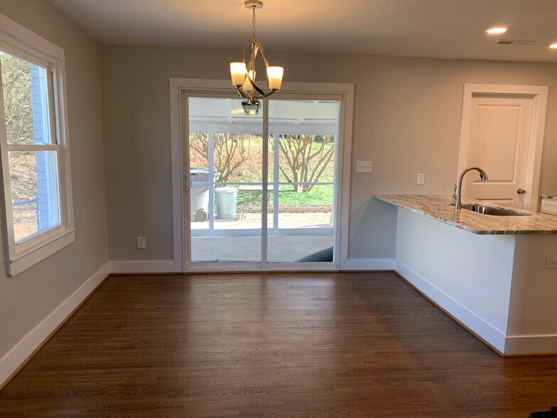 Patio doors lead to screened in porch - 3509 Sargeant Dr