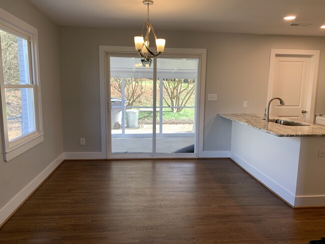 Patio doors lead to screened in porch - 3509 Sargeant Dr