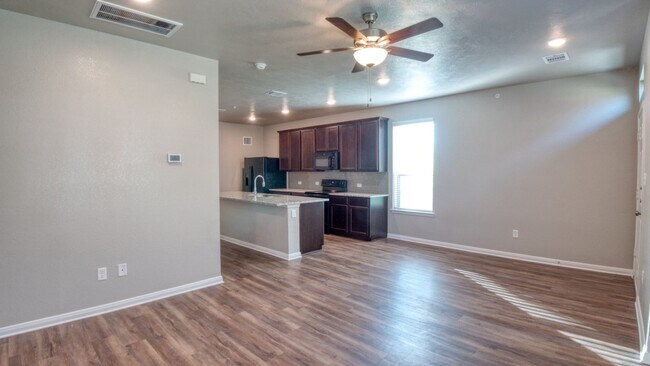 Building Photo - Live, love, and grow in this charming townhome!