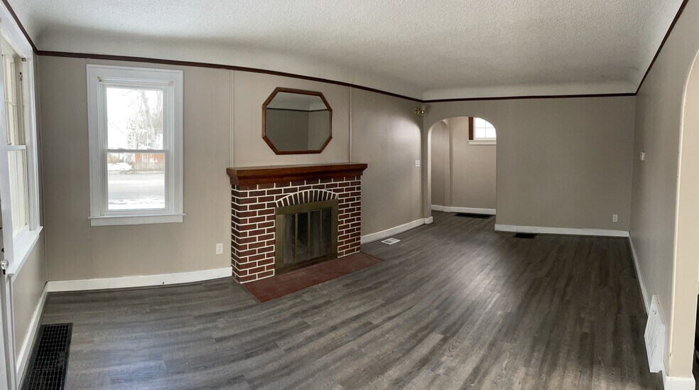 Nice cozy living area that allows natural light from all sides! - 592 E Montcalm St