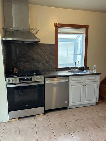 Kitchen with Dishwasher and New Gas Stove - 23 south 6th avenue