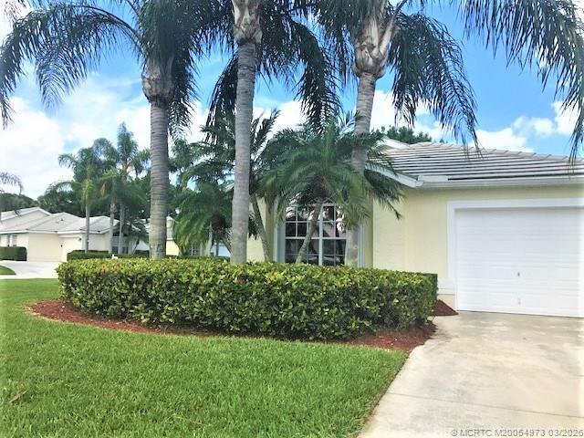 Building Photo - 3486 SW Pindo Palm Ln