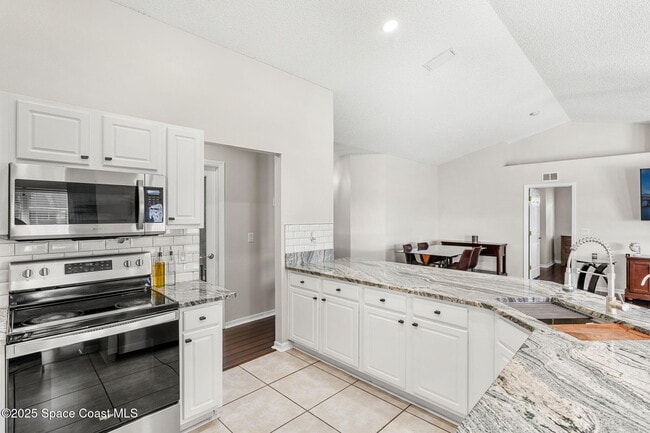 Building Photo - 413 Grenadier Ave NW