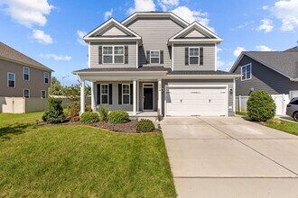 Building Photo - Exquisite 4-bedroom, 2.5-bath home located...