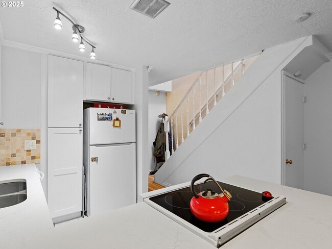Building Photo - Bright & Inviting 2-Bed, 1.5-Bath with Modern Touches and Private Upstairs Retreat