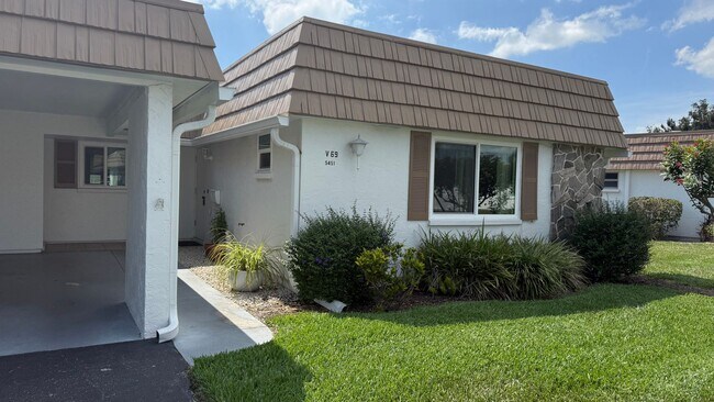 Building Photo - All inclusive 2BR/ 2B Condo in 55+ Community