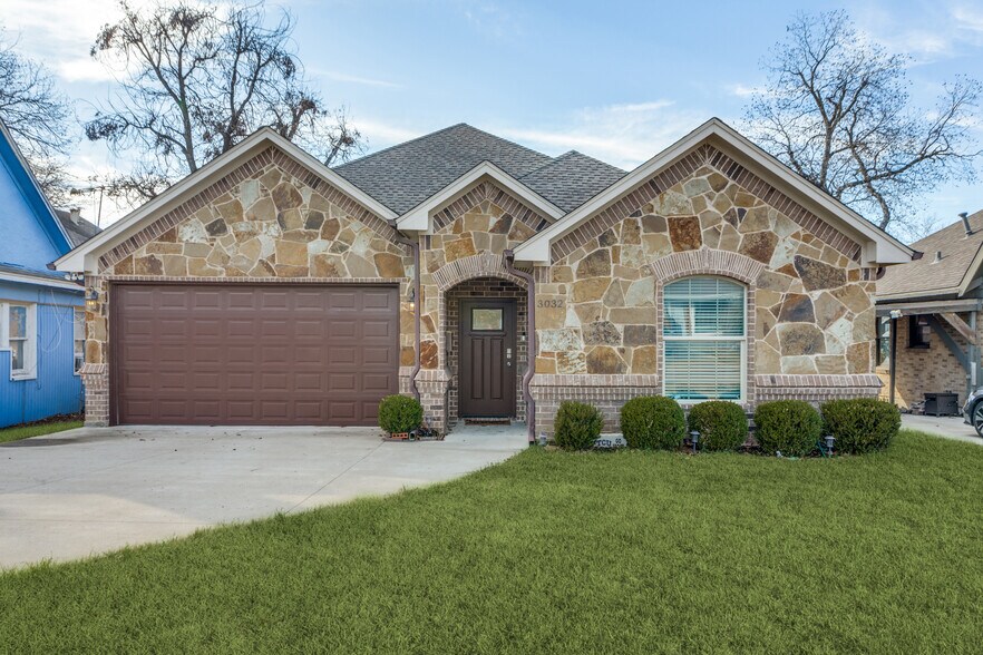 Front of property; stone and brick - 3032 James Ave