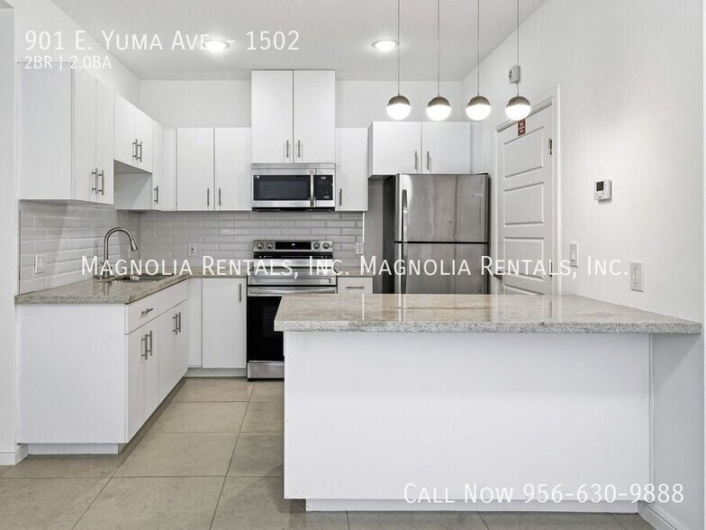 Building Photo - 901 E Yuma Ave