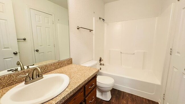 Building Photo - Creekwood Park Townhomes - Reduced rent + claim your choice of a brand-new 55" TV or a $250 Amazo...