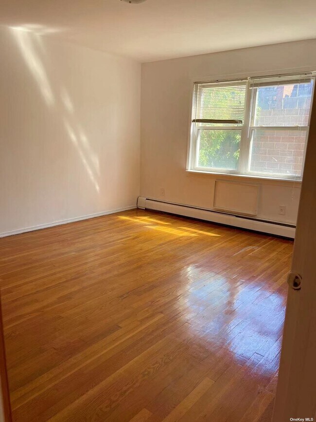 Building Photo - 144-08 38th Ave