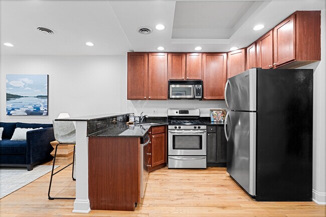 Building Photo - 950 W Belle Plaine Ave