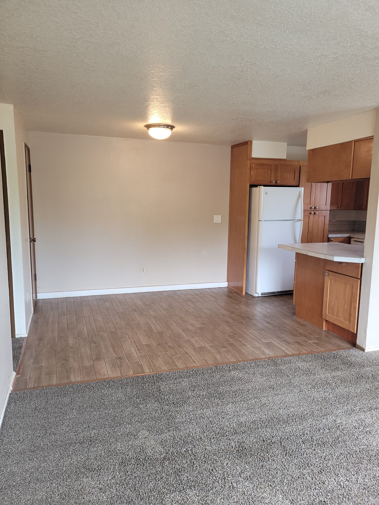unit d dining room with tile floor - 1045 S Jasper St