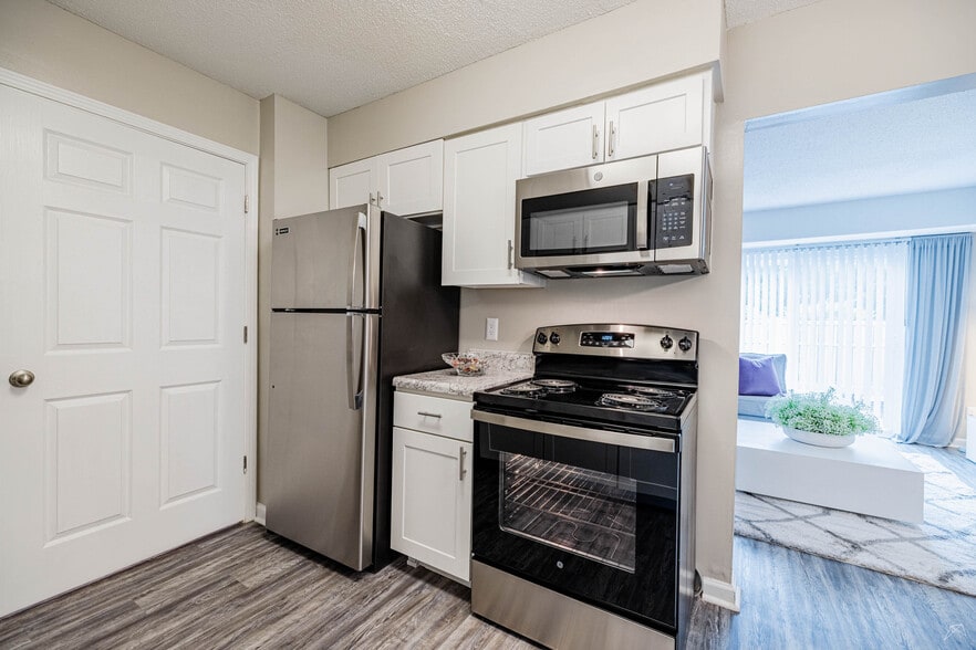 Building Photo - Woodland Creek Apartments