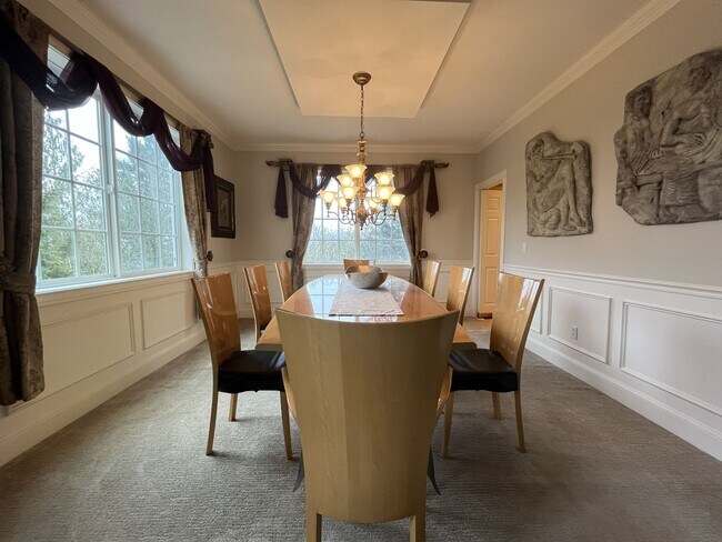 Building Photo - Executive-Style Northwest Heights Home with Forest Views and Refined Architectural Details