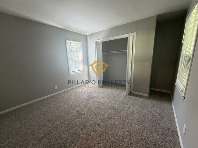 Building Photo - Charming 3-Bedroom Stone Bungalow with 2-Car Detached Garage & Fenced Yard, Available NOW!