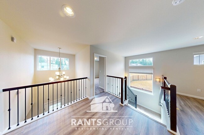 Building Photo - Luxury 4-Bedroom Home with 5-Car Garage & ...