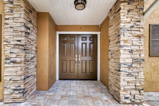Building Photo - Available Now! Waterfront Living at Its Best – Pool, Decks & Gated Privacy
