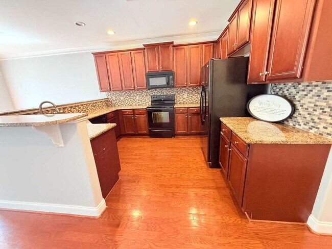 Building Photo - "Stylish 3-Bedroom Townhouse Featuring Granite Countertops & Cozy Fireplace in Winston-Salem"