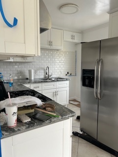 Kitchen- painting and cleaning now - 6943 1/2 Glasgow Ave