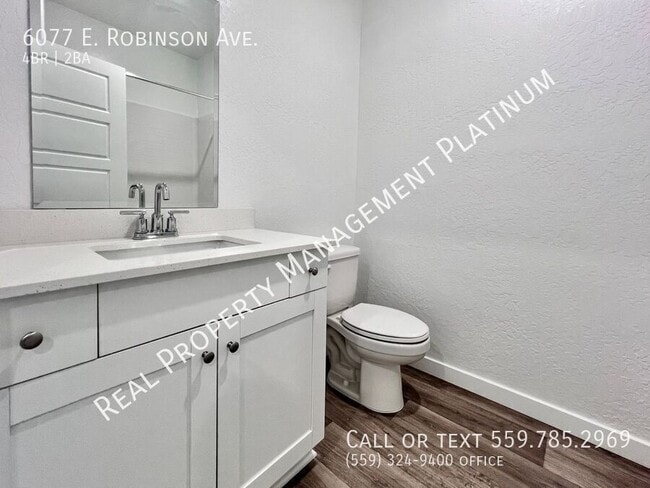 Building Photo - 6077 E Robinson Ave