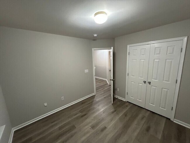 Building Photo - **Spacious 4-Bedroom Home with Walk-In Clo...