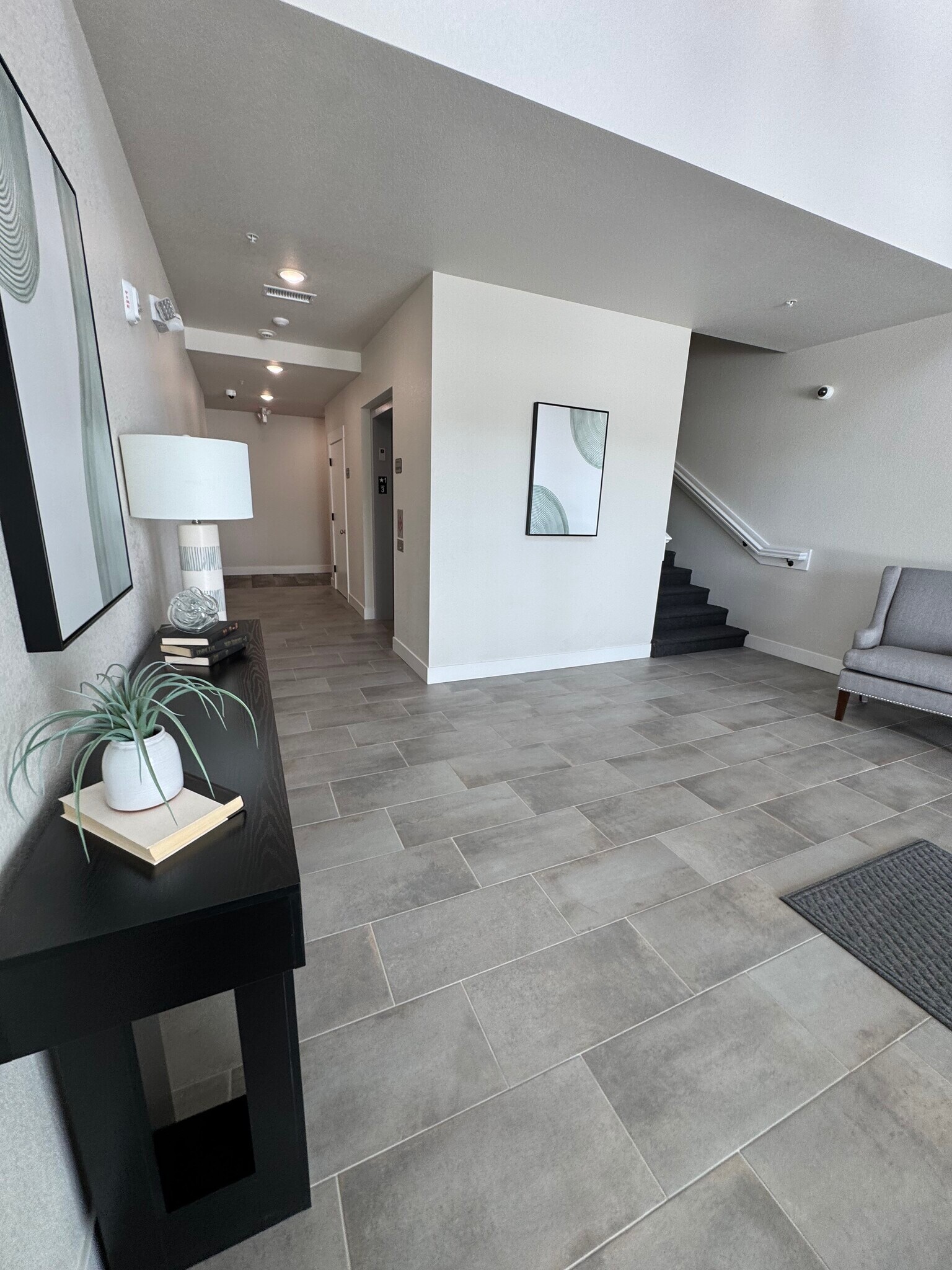 First floor lobby for elevator or stair access on West side of building - 265 High Point Dr