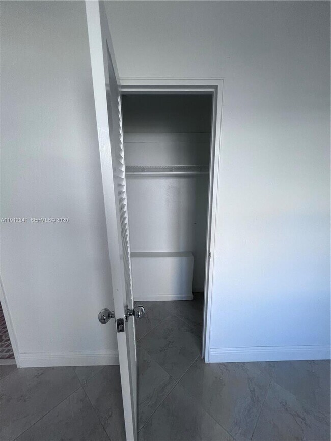 Building Photo - 10185 Collins Ave