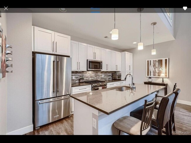 Building Photo - Modern Sloan’s Lake Townhome with Rooftop ...