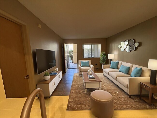 Building Photo - East side condo with community pool/spa/assigned covered parking place