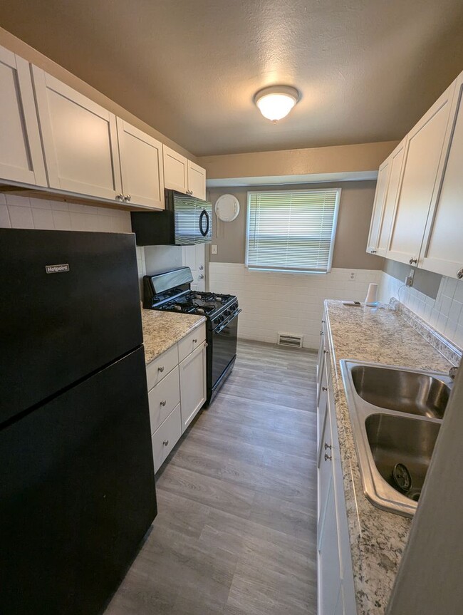 Building Photo - Welcome Home to 9312 Nelan!