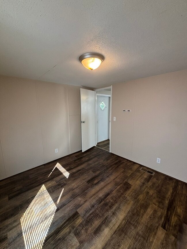 Building Photo - Triangle Mobile Home Park