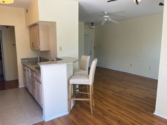 Building Photo - ** Second Floor Condo Available Now in Tid...