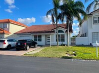 Building Photo - 10570 NW 51st St