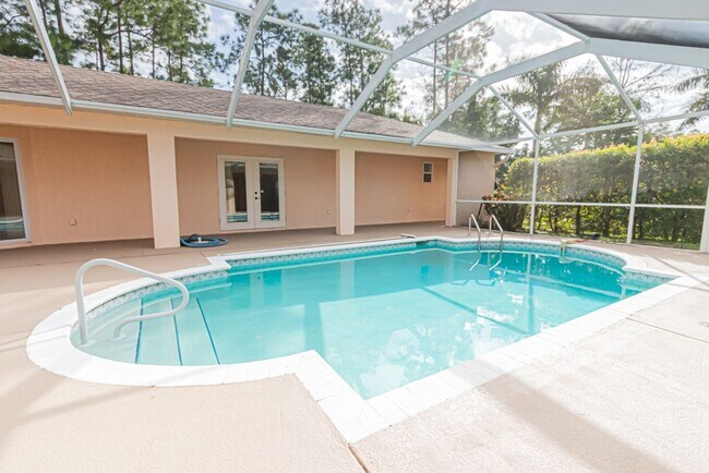 Building Photo - 5-Bed Home With Private Heated Pool & Large Yard - Pet Friendly!