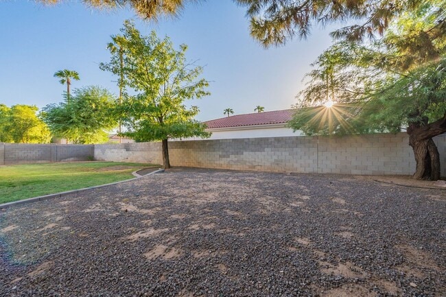 Building Photo - Spacious 5-Bedroom Home with Open Layout & Private Backyard