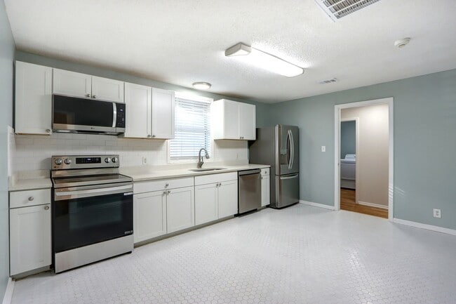 Building Photo - Renovated Single Family - Three Bedroom, Two Bathroom