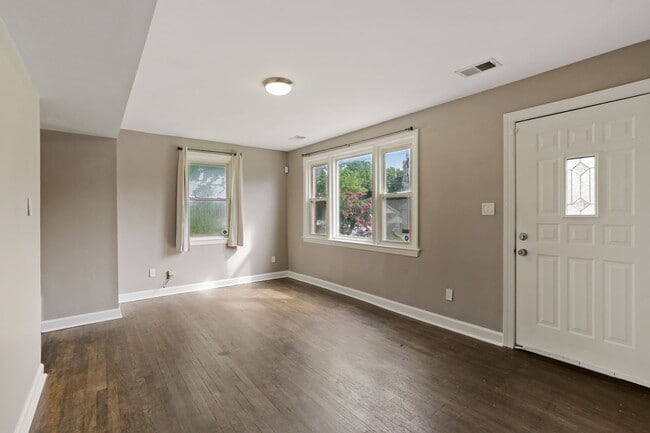 Building Photo - Move-In Ready Cape Cod with 3 Finished Levels & Huge Backyard