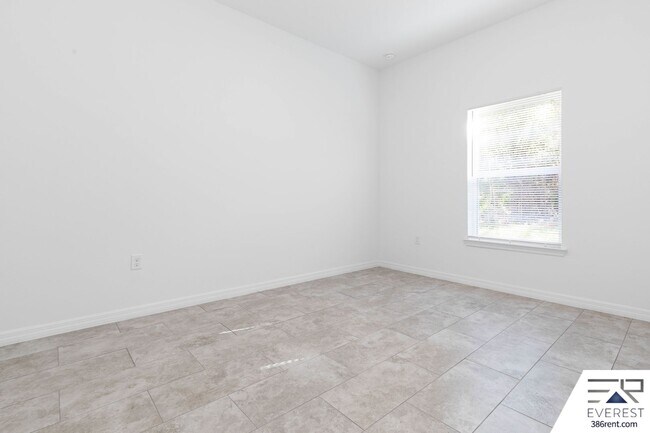 Building Photo - Modern 3-Bed, 2-Bath Townhome with Private Yard & 2-Car Garage