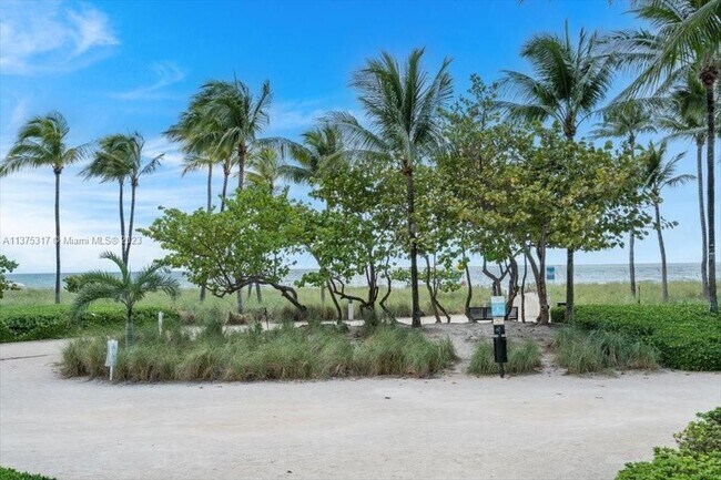 Building Photo - 10155 Collins Ave