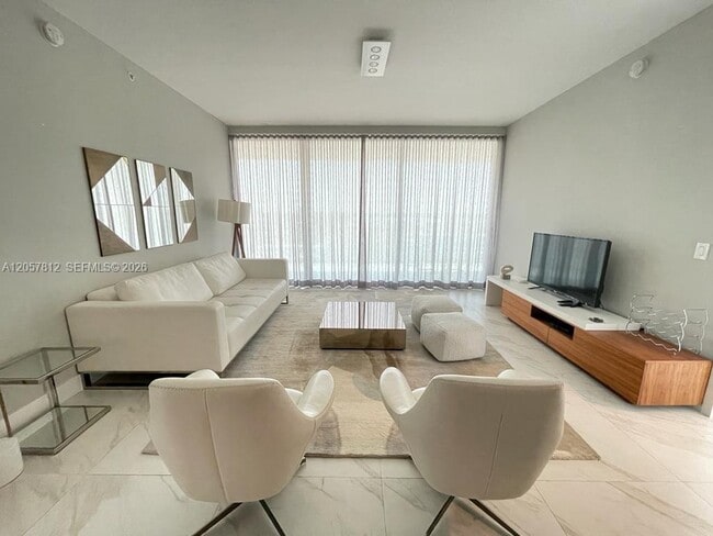 Building Photo - 10201 Collins Ave