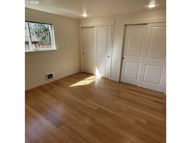 Building Photo - Bright and Airy Home with Stainless Steel Kitchen, Vaulted Ceilings & Washer + Dryer
