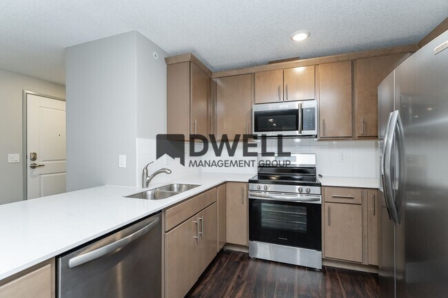 Building Photo - Brand NEW Caroline Apartments - 207-Move i...