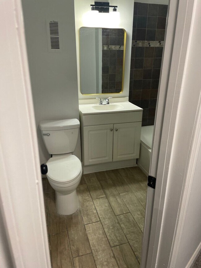 Building Photo - Historic Charm Meets Modern Comfort: 2BR Baltimore Townhouse with Private Yard