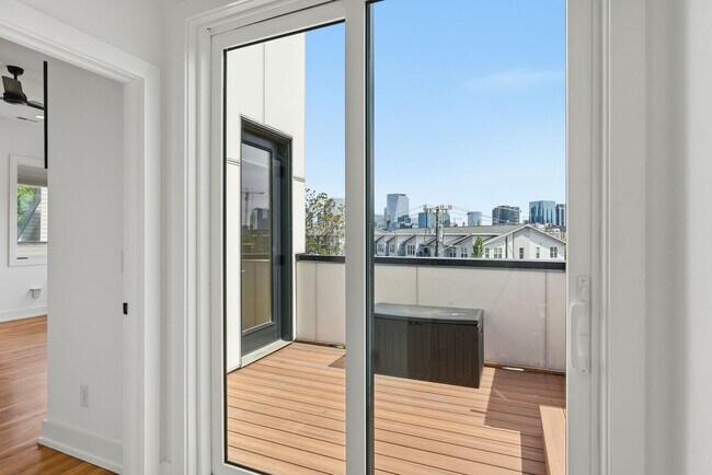 Building Photo - Beautiful 3-BR Property with Rooftop Deck!