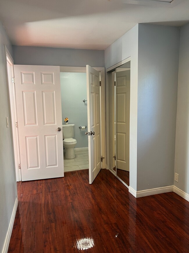 Bedroom mirror closets - 511 E Rio Grande St