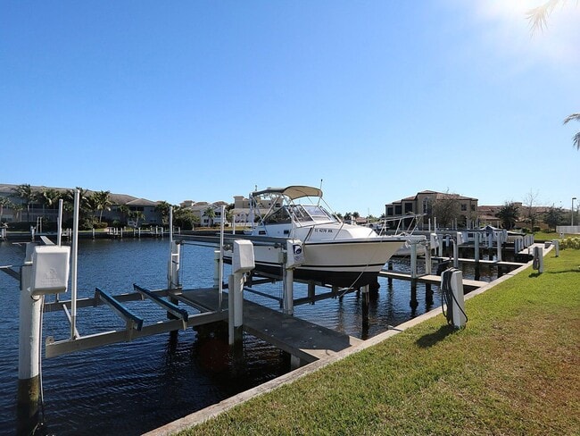 Building Photo - BEAUTIFUL 3-BEDROOM  WATERFRONT CONDO WITH BOAT SLIP AND HEATED POOL