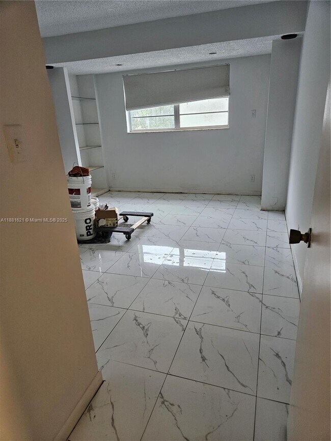 Building Photo - 11131 Royal Palm Blvd
