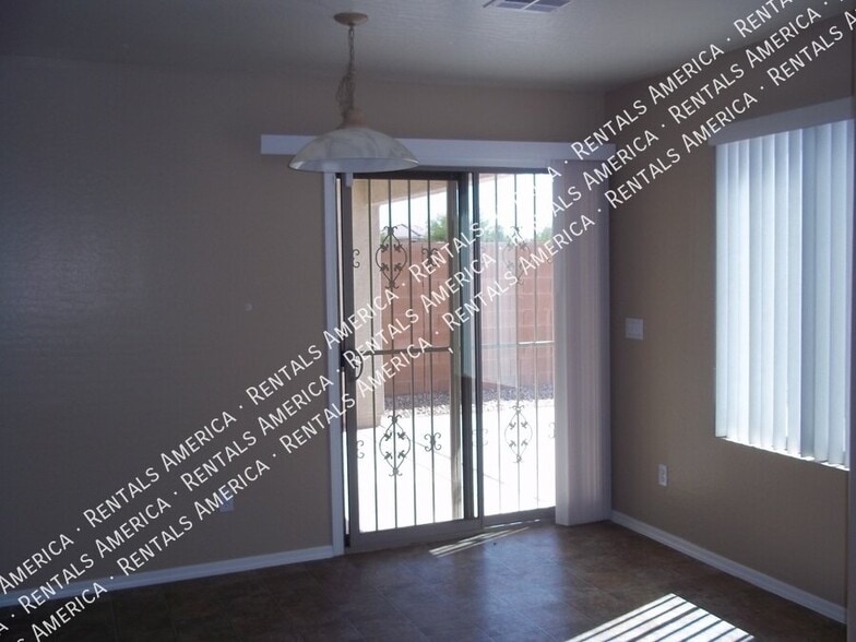 Building Photo - 6605 W Desert Ln