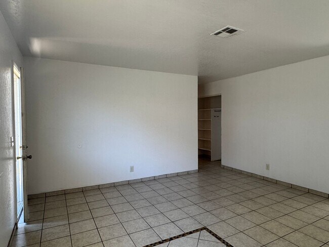 Building Photo - Two Bedroom Triplex with One Bathroom and ...