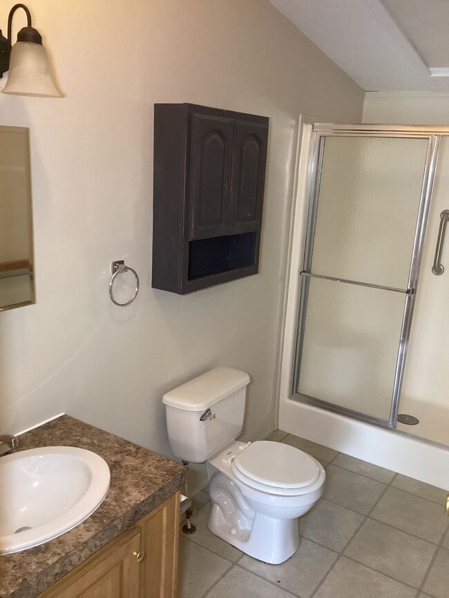 Building Photo - Three Bedroom House